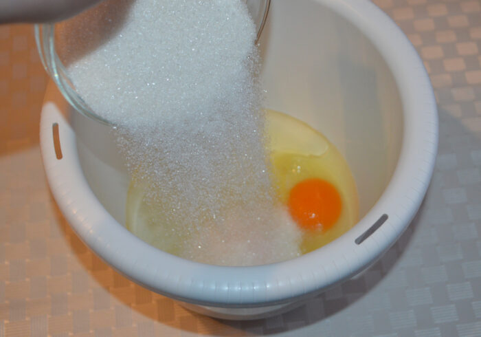 Eggs, oil and sugar whipped with a hand mixer until pale and foamy