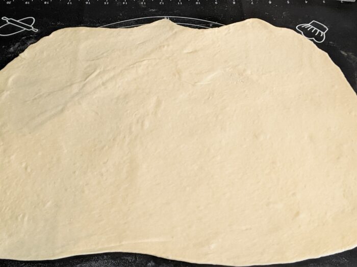 Flatten the other piece into a rough rectangle