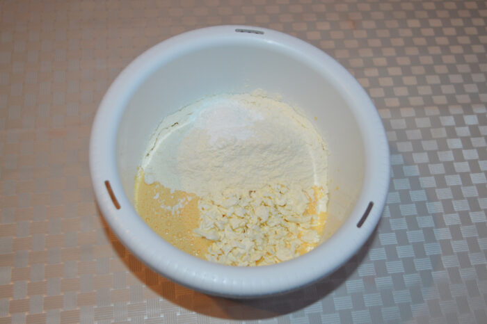Incorporating flour and baking powder into the batter with a mixer