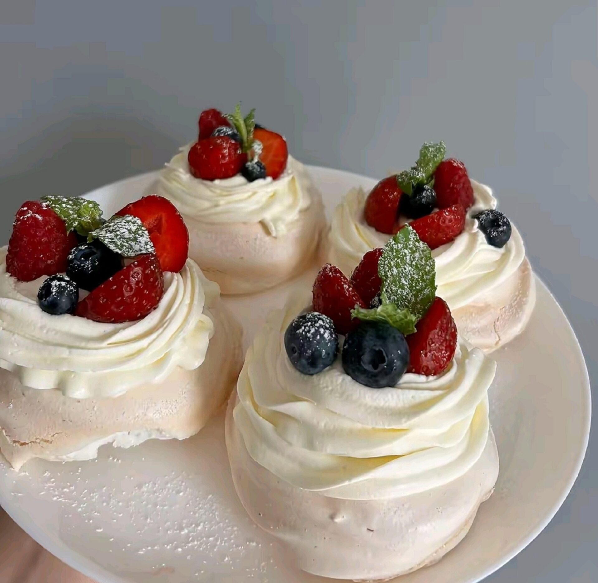 Mini Berry Pavlova Cakes with Mascarpone Cream