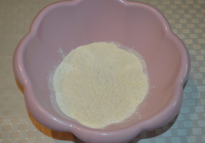 Flour in a large mixing bowl for pizza dough