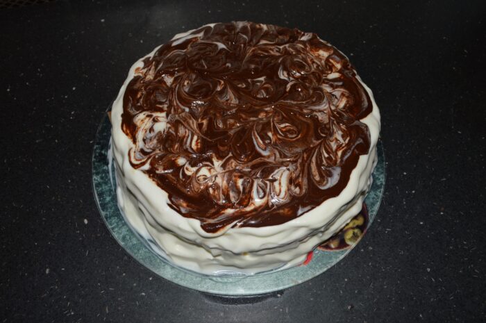 Finished Smetannik cake resting in the refrigerator overnight